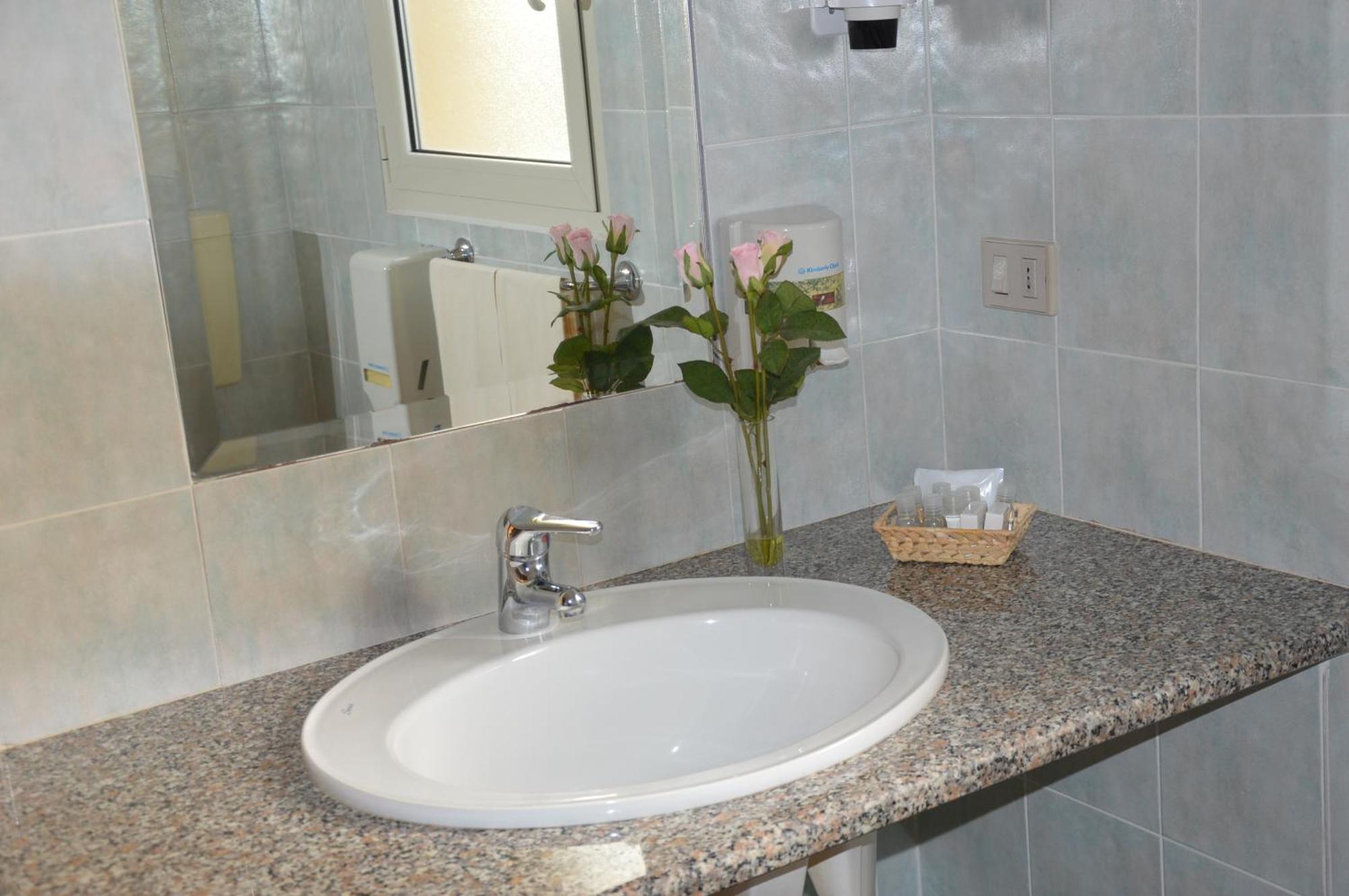 Hotel La Palma San Teodoro  Pokoj fotografie
